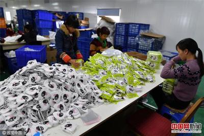 防霾口罩供不應(yīng)求 廈門一企業(yè)日出貨30萬個(gè)_手機(jī)中國(guó)網(wǎng)